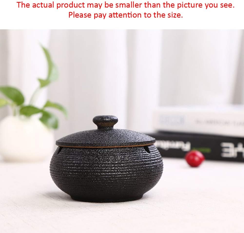 Lependor Black Ceramic Ashtray with windproof lid, displayed on a table, ideal for indoor or outdoor smoking, home, or office decoration.