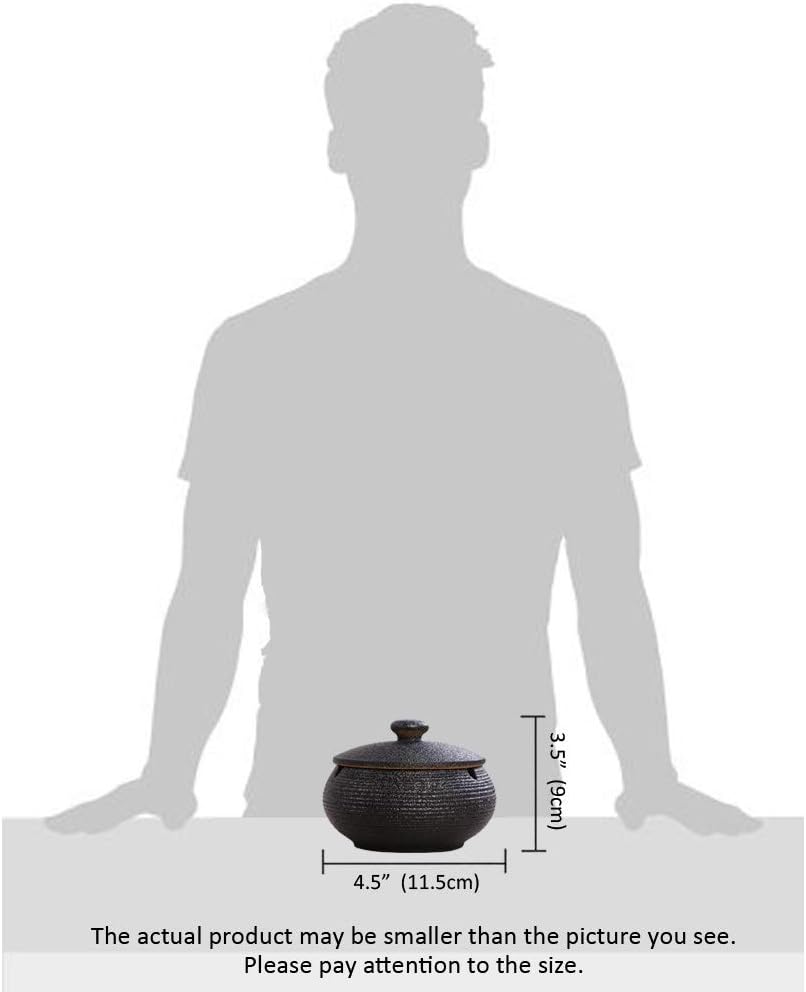 Lependor Black Ceramic Ashtray with windproof lid, displayed on a table, ideal for indoor or outdoor smoking, home, or office decoration.